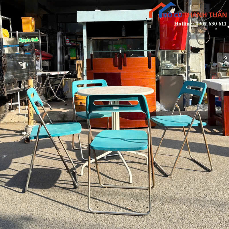 bo-ban-cafe-4-ghe-3 Bộ Bàn Cafe Cũ 4 Ghế Màu Xanh Gấp Gọn Tiện Lợi