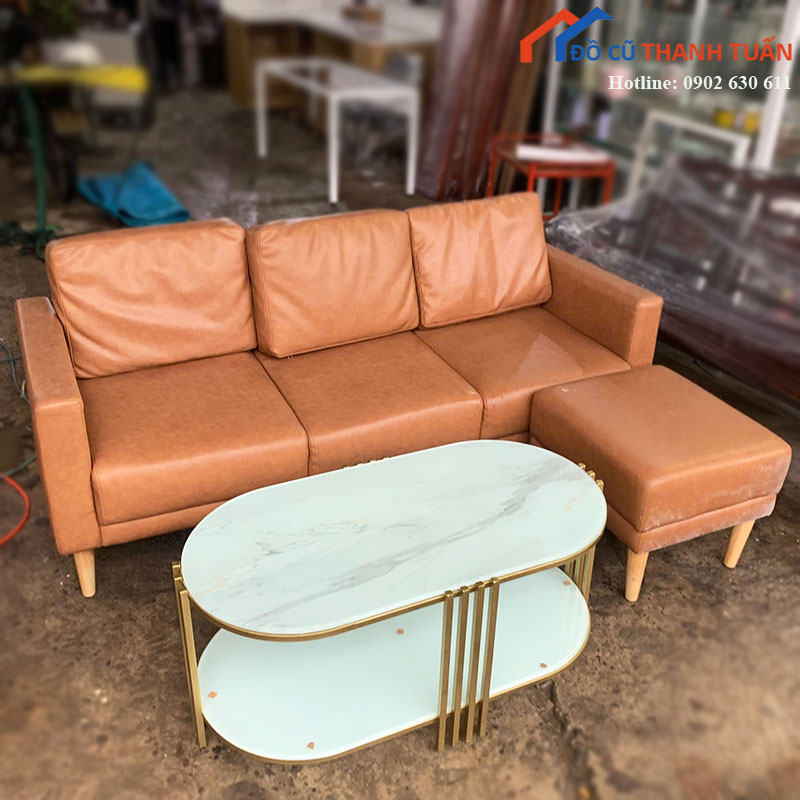 bo-sofa-phong-khach-cu-boc-da-nau-kem-don-1 Bộ Sofa Phòng Khách Cũ Bọc Da Nâu Kèm Đôn